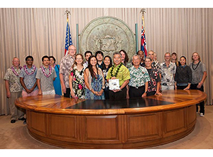 Project Imua team and WCC Chancellor standing with Governor Ige